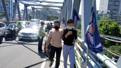 Viral Penampakan Pria di Jembatan Cangar Sebelum Bunuh Diri – detikcom: Fakta Lengkap dan Reaksi Publik